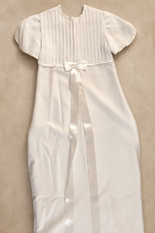 Vestido cintura con moño.