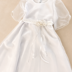 Vestido lazo con perlas.