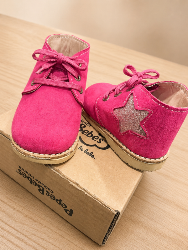 Botitas estrella fucsia