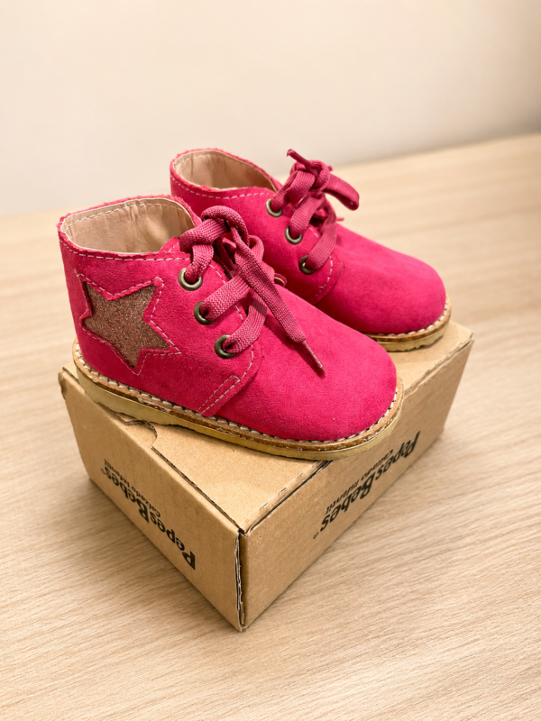 Botitas estrella fucsia